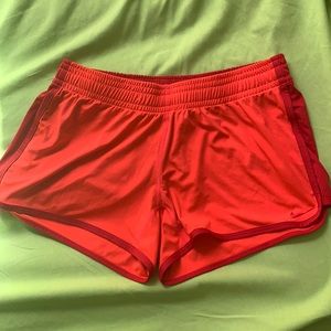 Nike Dri Fit orange and red running/walking/athletic shorts women’s size M